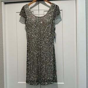 Beautiful sequins dress by jump apparel size 11/12 new with tags.